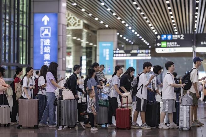 多图直击！返程高峰来袭，广州地铁多个车站限流