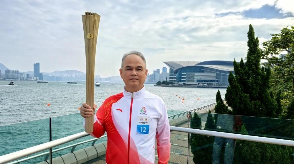 全国移民管理系统唯一代表参加十五运会火炬传递仪式