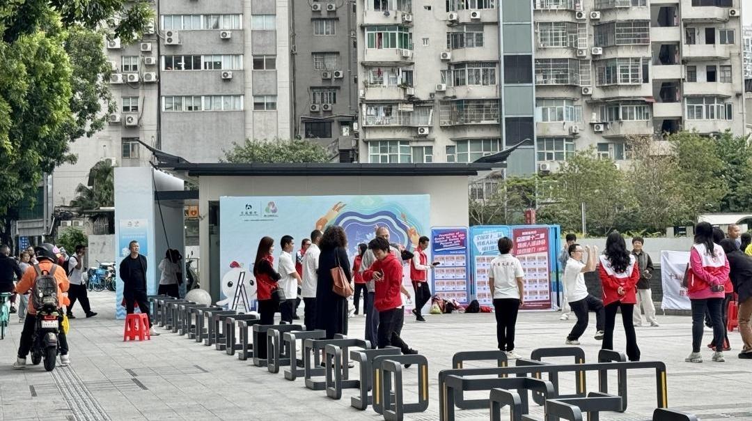 全运年 看广州丨“小海豚”深入大街小巷，志愿服务站点穿上“科技衣”