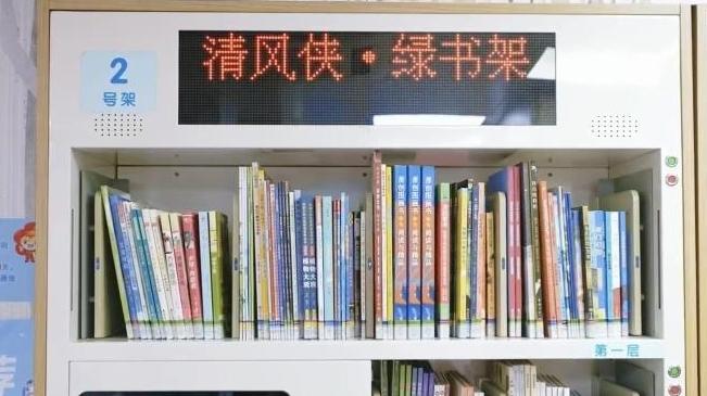 “护苗”润书香， “悦读”伴成长